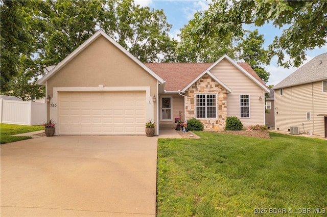 790 College Blvd, Osage Beach, MO 65065 - view of front of property with central AC, a garage, stone siding, and concrete driveway