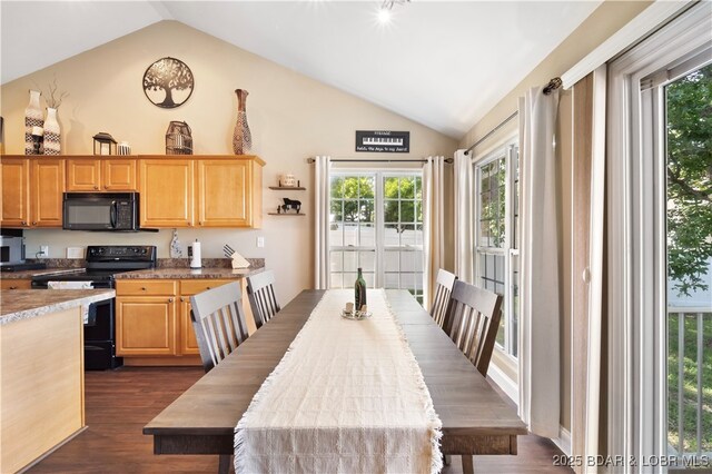 790 College Blvd, Osage Beach, MO 65065 - dining area with vaulted ceiling and dark wood-type flooring