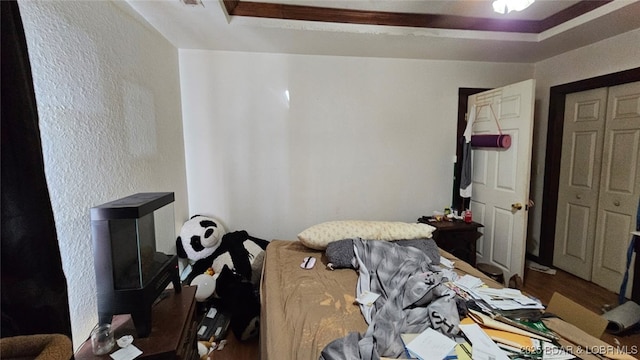 1501 Long Ln, Eldon, MO 65026 - bedroom with a textured wall and wood finished floors