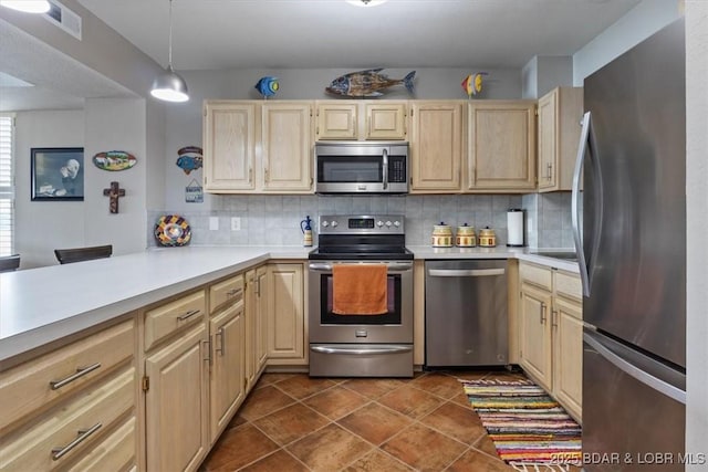 90 Falls Point Dr Unit 2C, Lake Ozark, MO 65049 - kitchen featuring stainless steel appliances, light brown cabinets, and tasteful backsplash