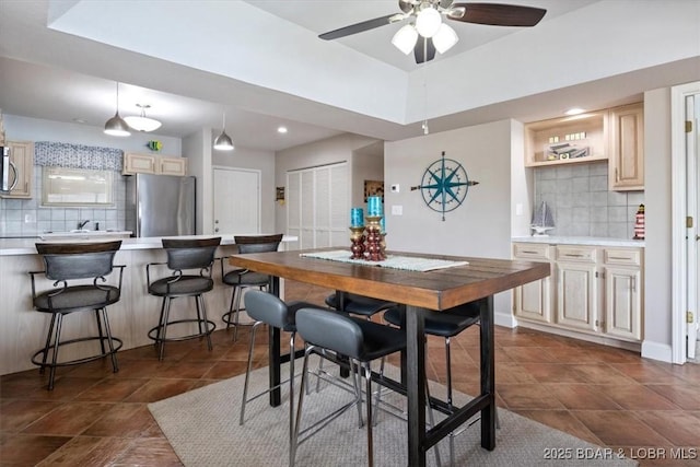 90 Falls Point Dr Unit 2C, Lake Ozark, MO 65049 - dining room with a ceiling fan, recessed lighting, and dark tile patterned floors