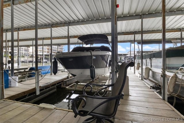 90 Falls Point Dr Unit 2C, Lake Ozark, MO 65049 - dock area featuring boat lift