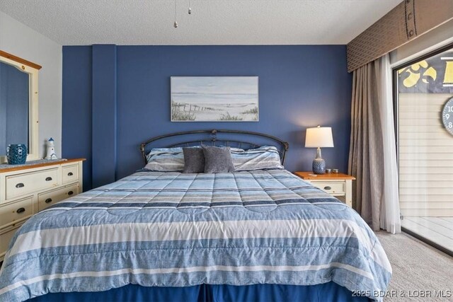 90 Falls Point Dr Unit 2C, Lake Ozark, MO 65049 - bedroom featuring carpet flooring and a textured ceiling
