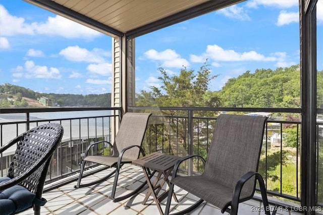90 Falls Point Dr Unit 2C, Lake Ozark, MO 65049 - balcony with a water view