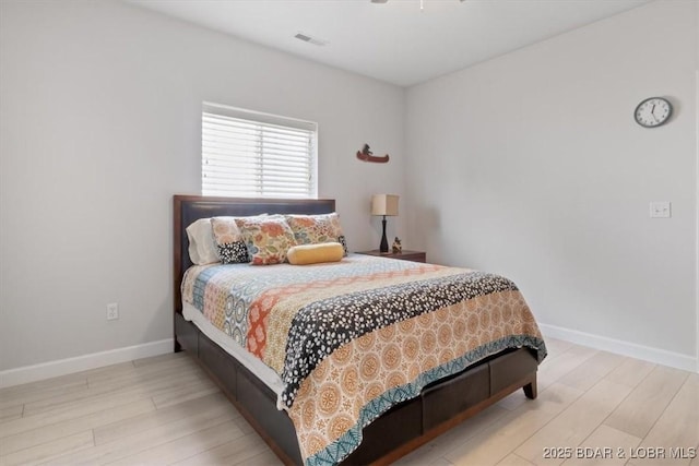 166 Oak Harbor Dr Unit 3D, Camdenton, MO 65020 - bedroom featuring wood finished floors and baseboards