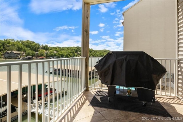 166 Oak Harbor Dr Unit 3D, Camdenton, MO 65020 - balcony featuring a grill and a water view