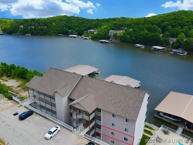 166 Oak Harbor Dr Unit 3D, Camdenton, MO 65020 - aerial view of a large body of water and a heavily wooded area