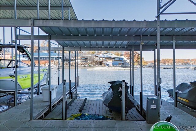 1184 Jeffries Rd Unit 310, Osage Beach, MO 65065 - dock area featuring boat lift and a water view