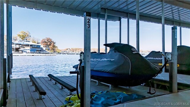 1184 Jeffries Rd Unit 310, Osage Beach, MO 65065 - dock area with boat lift and a water view