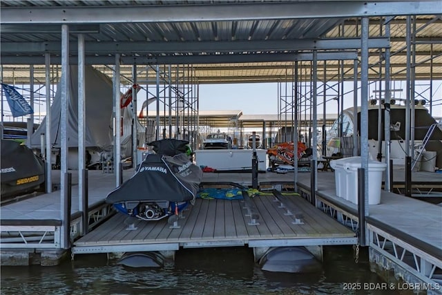 1184 Jeffries Rd Unit 310, Osage Beach, MO 65065 - dock area with boat lift and a water view
