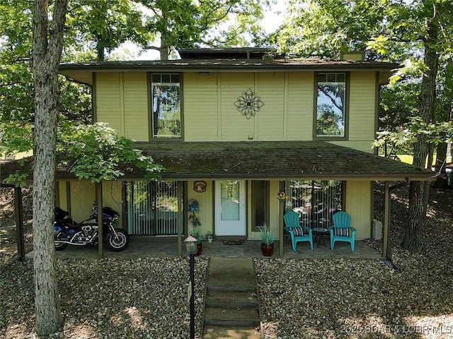 24 Canoe Ct, Osage Beach, MO 65065 - view of front of house with a porch