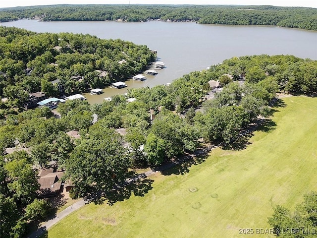 24 Canoe Ct, Osage Beach, MO 65065 - drone / aerial view of a nearby body of water and a heavily wooded area