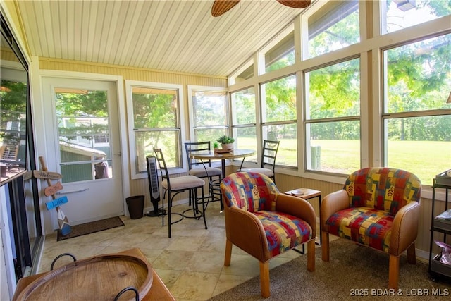 24 Canoe Ct, Osage Beach, MO 65065 - sunroom with vaulted ceiling, ceiling fan, and tile patterned flooring