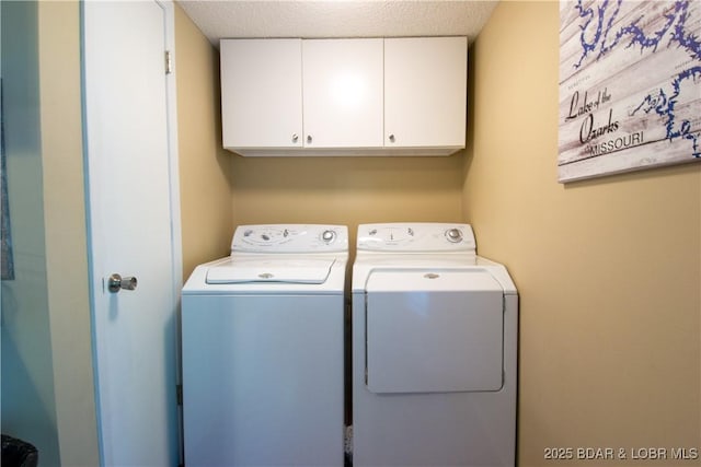 24 Canoe Ct, Osage Beach, MO 65065 - laundry area with cabinet space, washing machine and dryer, and a textured ceiling