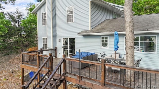 2195 Valley Rd, Osage Beach, MO 65065 - back of property with an outdoor hangout area, a deck, and a shingled roof