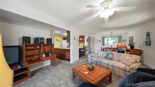 5940 Baydy Peak Rd Unit 325, Osage Beach, MO 65065 - living room featuring light colored carpet and ceiling fan