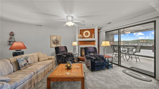 5940 Baydy Peak Rd Unit 325, Osage Beach, MO 65065 - living area featuring ceiling fan and carpet flooring