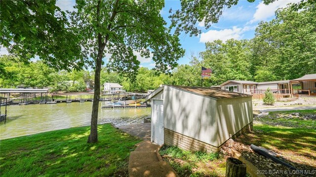 47 Dixie Ln, Sunrise Beach, MO 65079 - view of outbuilding with a water view