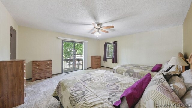 47 Dixie Ln, Sunrise Beach, MO 65079 - bedroom with access to outside, light carpet, a textured ceiling, and a ceiling fan