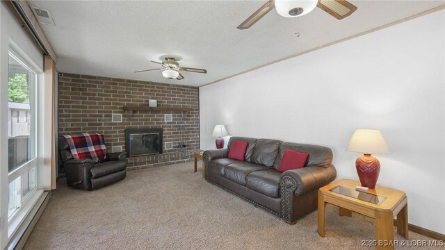 47 Dixie Ln, Sunrise Beach, MO 65079 - carpeted living room featuring a ceiling fan, a brick fireplace, and a textured ceiling
