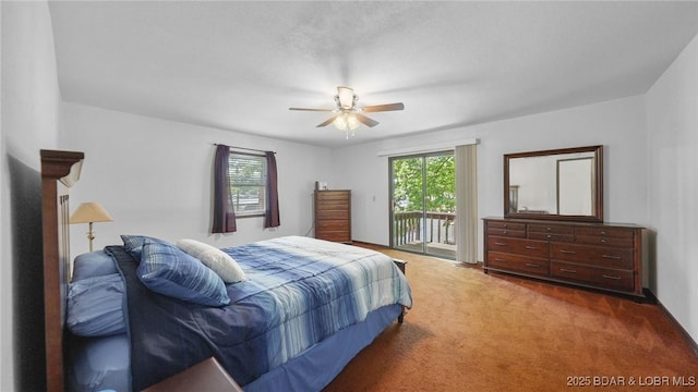 47 Dixie Ln, Sunrise Beach, MO 65079 - carpeted bedroom with access to exterior and ceiling fan