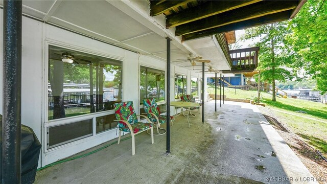 47 Dixie Ln, Sunrise Beach, MO 65079 - view of patio / terrace featuring a ceiling fan
