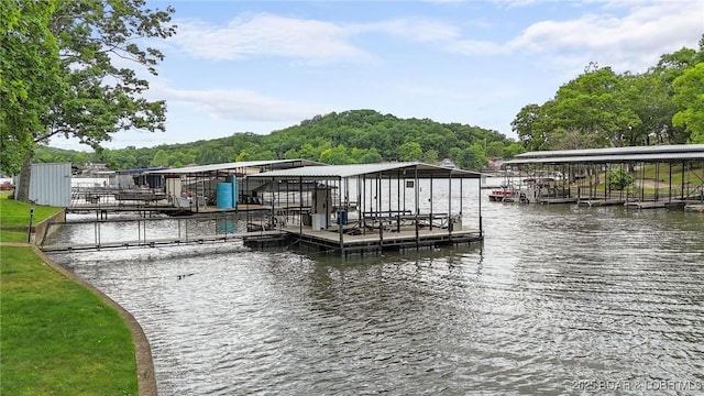 47 Dixie Ln, Sunrise Beach, MO 65079 - dock area featuring boat lift and a water view