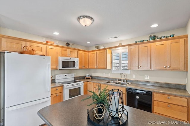 29566 Hunter Rd, Gravois Mills, MO 65037 - kitchen featuring white appliances, a sink, and recessed lighting