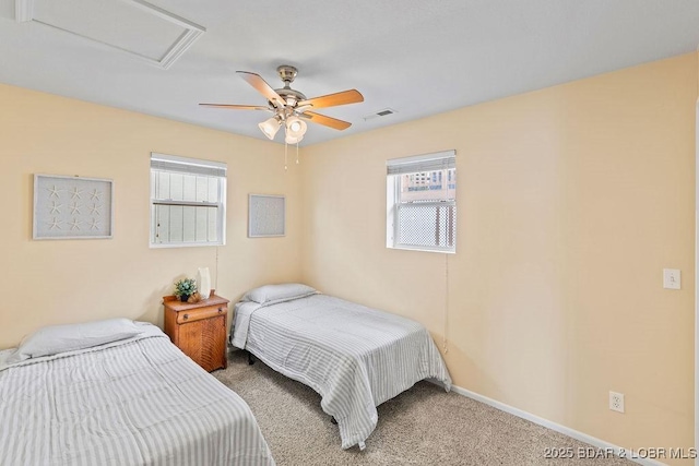 29566 Hunter Rd, Gravois Mills, MO 65037 - carpeted bedroom with attic access, multiple windows, ceiling fan, and baseboards