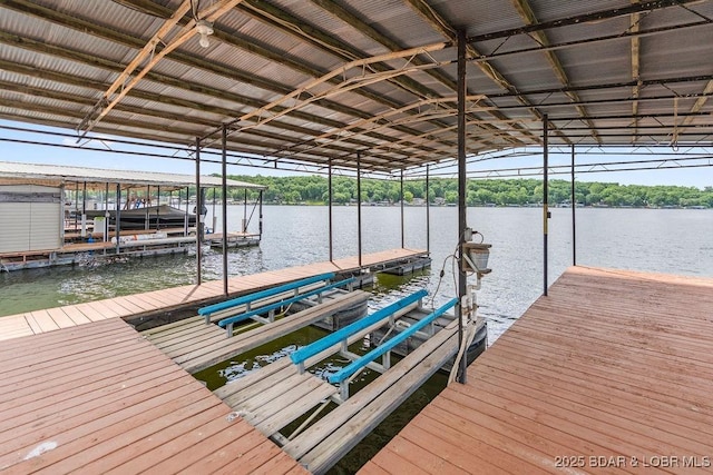 29566 Hunter Rd, Gravois Mills, MO 65037 - dock featuring boat lift and a water view