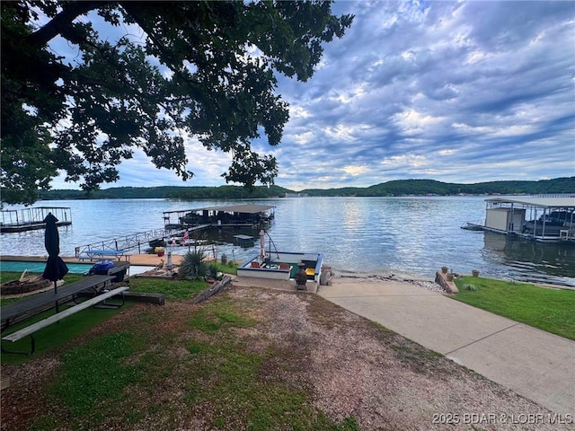 35 Knotty Pine Ln, Camdenton, MO 65020 - dock area featuring a water view and a boat ramp