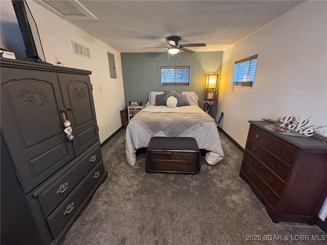 35 Knotty Pine Ln, Camdenton, MO 65020 - carpeted bedroom with a textured ceiling, multiple windows, and a ceiling fan