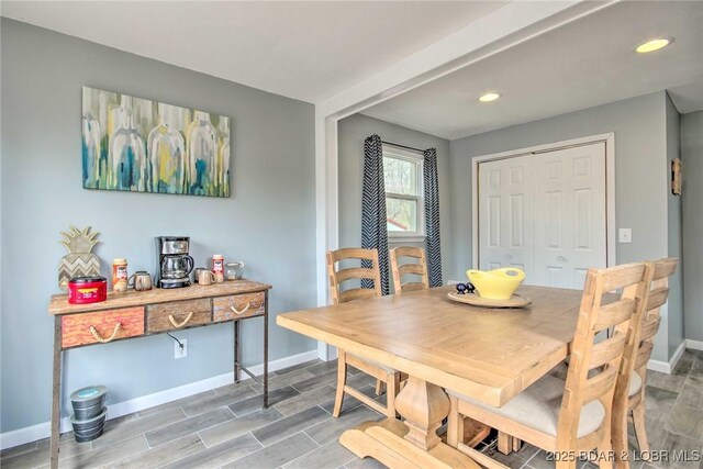 31806 Lakeview Ln, Gravois Mills, MO 65037 - dining area featuring baseboards, wood finish floors, and recessed lighting