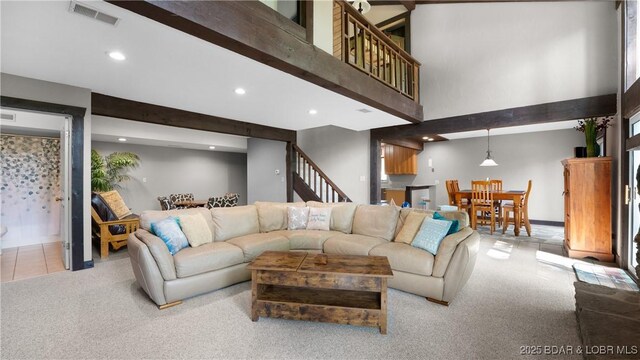 62 Durham Ct, Four Seasons, MO 65049 - living area featuring stairway, light colored carpet, recessed lighting, and a high ceiling
