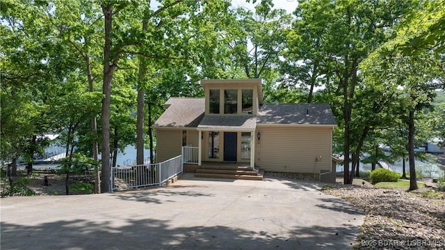 62 Durham Ct, Four Seasons, MO 65049 - view of front of property featuring a porch and driveway