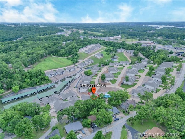879 Great Ship St, Osage Beach, MO 65065 - view of property location with nearby suburban area and a forest