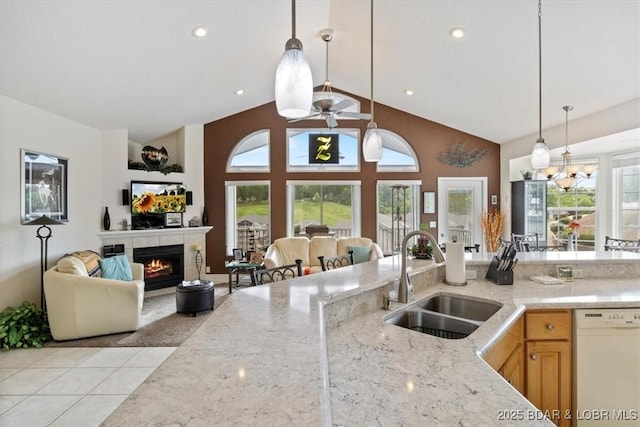 879 Great Ship St, Osage Beach, MO 65065 - kitchen featuring white dishwasher, a sink, plenty of natural light, open floor plan, and lofted ceiling