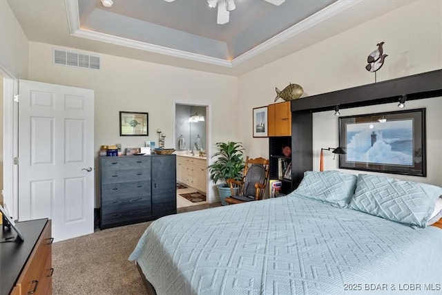 879 Great Ship St, Osage Beach, MO 65065 - carpeted bedroom with a raised ceiling, crown molding, a ceiling fan, and connected bathroom