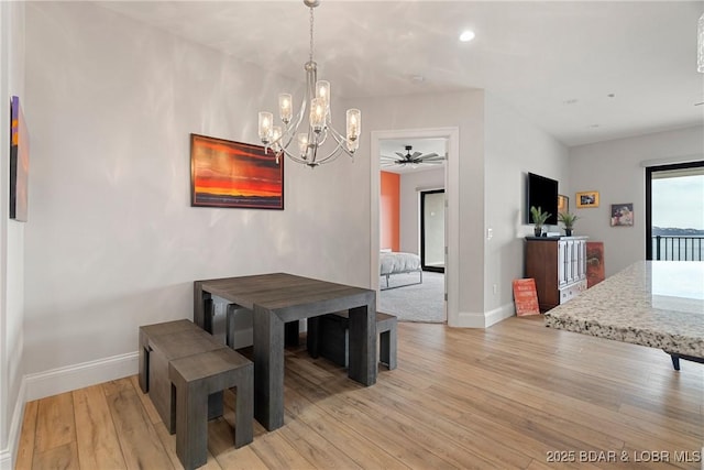 166 Captiva Dr Unit 8B, Sunrise Beach, MO 65079 - dining area featuring baseboards, a chandelier, light wood finished floors, ceiling fan, and recessed lighting