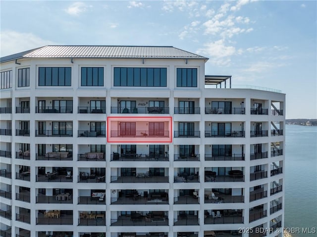 166 Captiva Dr Unit 8B, Sunrise Beach, MO 65079 - view of apartment building / complex featuring a water view