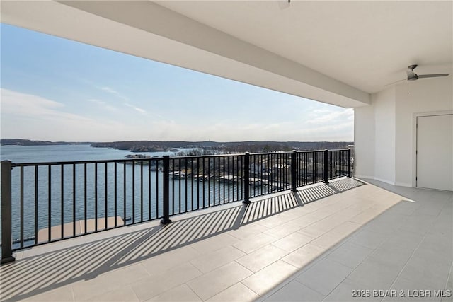 166 Captiva Dr Unit 8B, Sunrise Beach, MO 65079 - balcony with a water view and ceiling fan