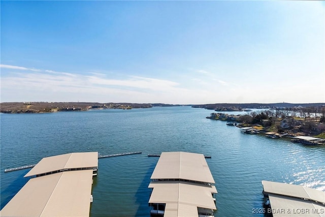 166 Captiva Dr Unit 8B, Sunrise Beach, MO 65079 - dock area featuring a water view