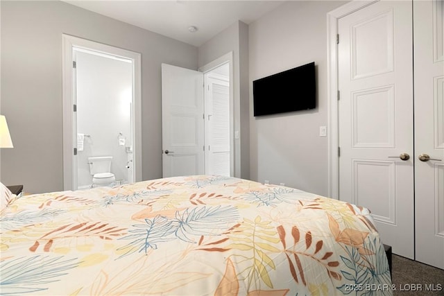 166 Captiva Dr Unit 8B, Sunrise Beach, MO 65079 - bedroom featuring ensuite bathroom and carpet floors