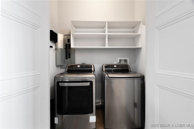166 Captiva Dr Unit 8B, Sunrise Beach, MO 65079 - laundry area featuring washing machine and dryer and electric panel
