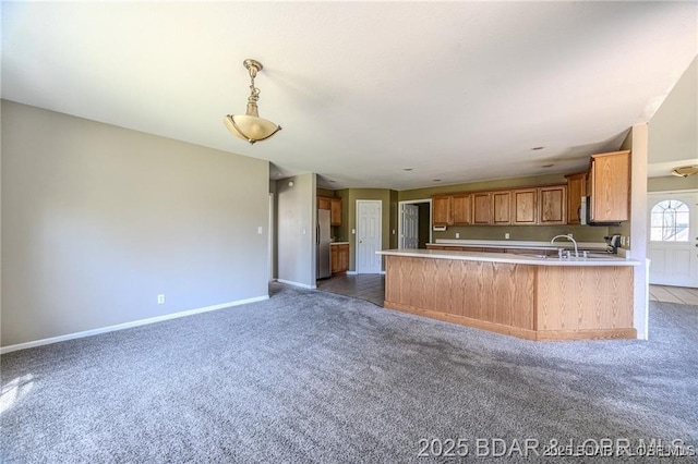 20715 Hiltner Ln, Saint Robert, MO 65584 - kitchen featuring carpet flooring, light countertops, and baseboards