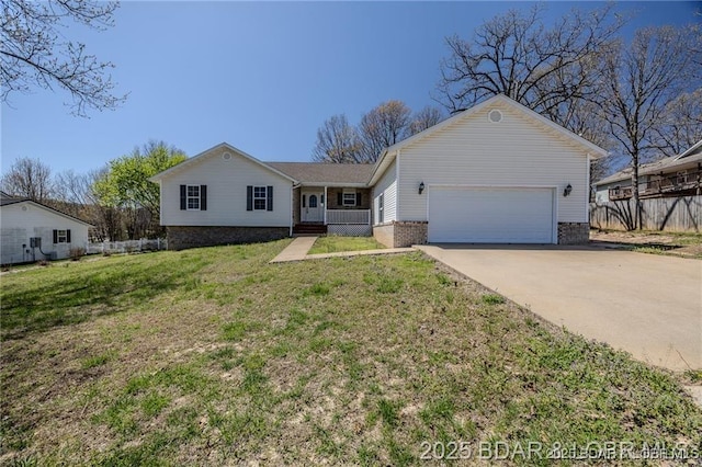 20715 Hiltner Ln, Saint Robert, MO 65584 - ranch-style home featuring an attached garage, concrete driveway, and brick siding