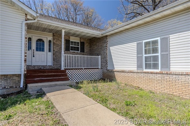 20715 Hiltner Ln, Saint Robert, MO 65584 - property entrance featuring brick siding and covered porch
