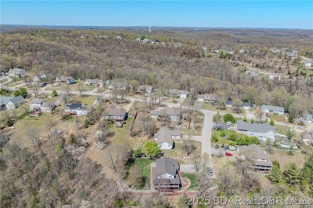 20715 Hiltner Ln, Saint Robert, MO 65584 - view of property location featuring nearby suburban area and a heavily wooded area