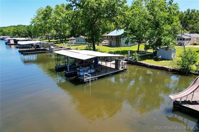 30734 Ottersway Rd, Gravois Mills, MO 65037 - dock area with boat lift, a water view, and a lawn