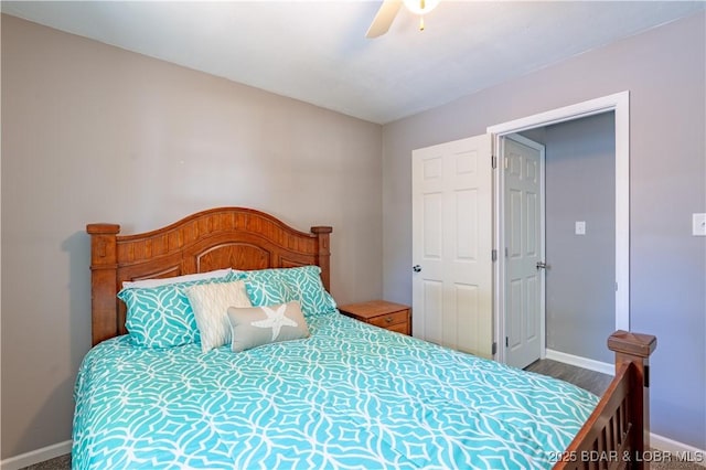 30734 Ottersway Rd, Gravois Mills, MO 65037 - bedroom featuring baseboards, ceiling fan, and wood finished floors